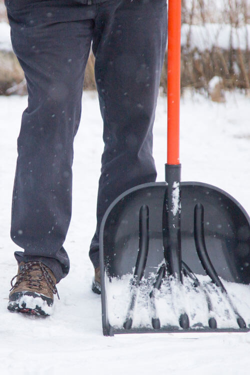 Person Shoveling Snow